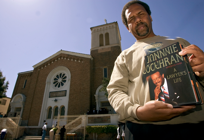 In April 2005, a man stands outside Second Baptist Church where the funeral for Johnnie Cochran Jr. took place